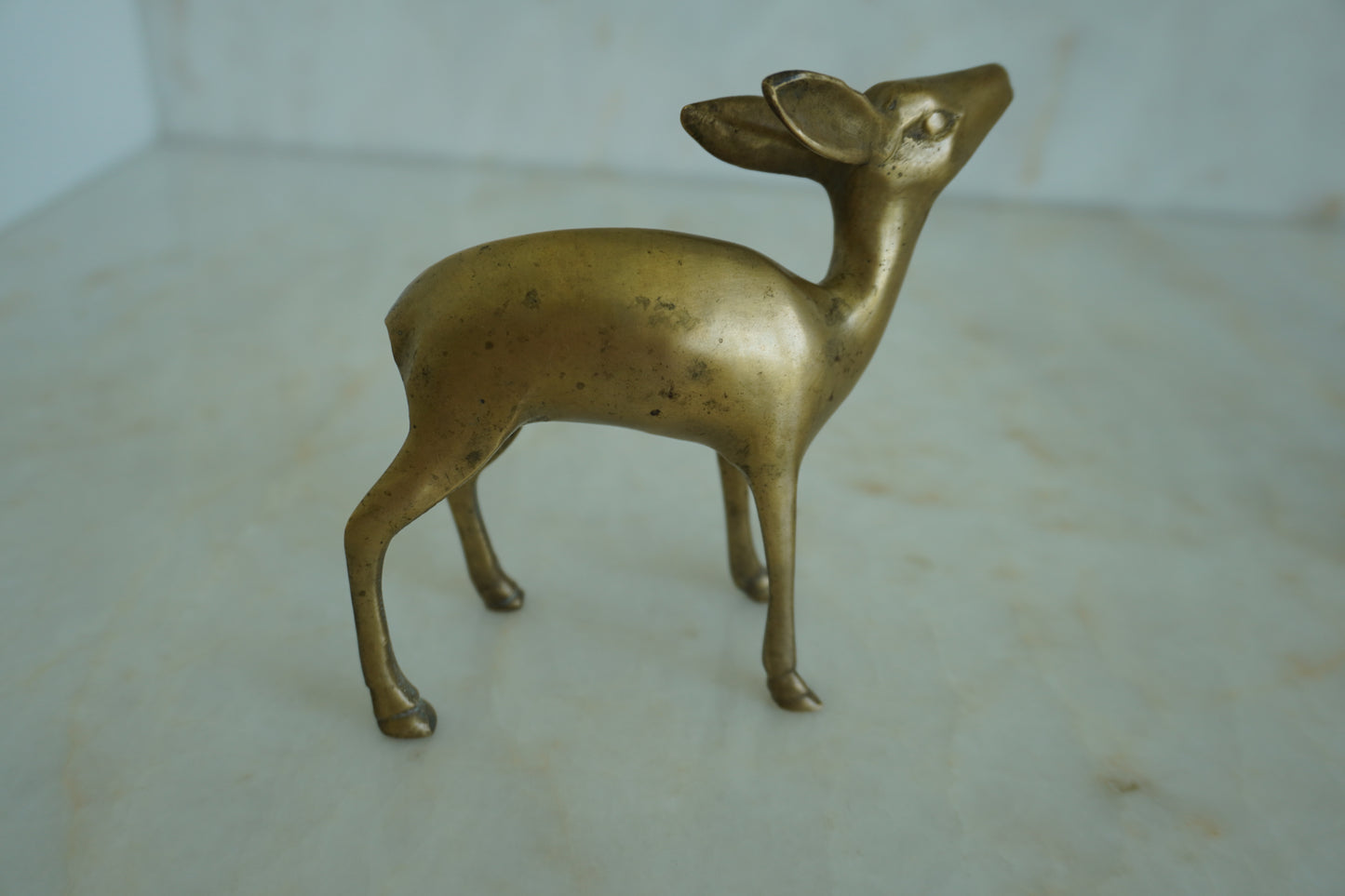 Deer brass